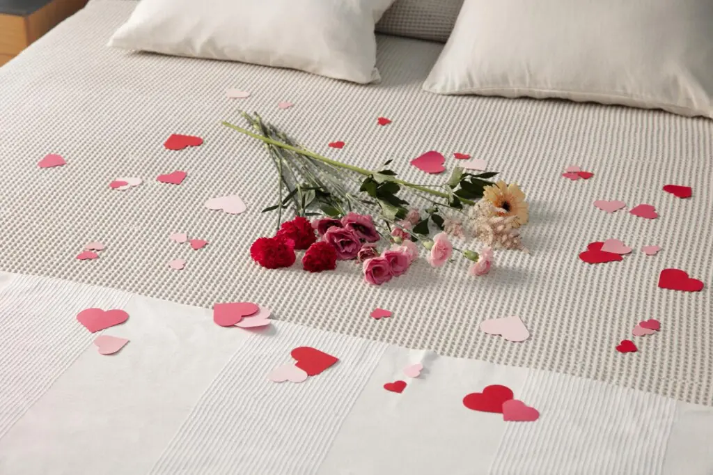 close up romantic breakfast bed arrangement