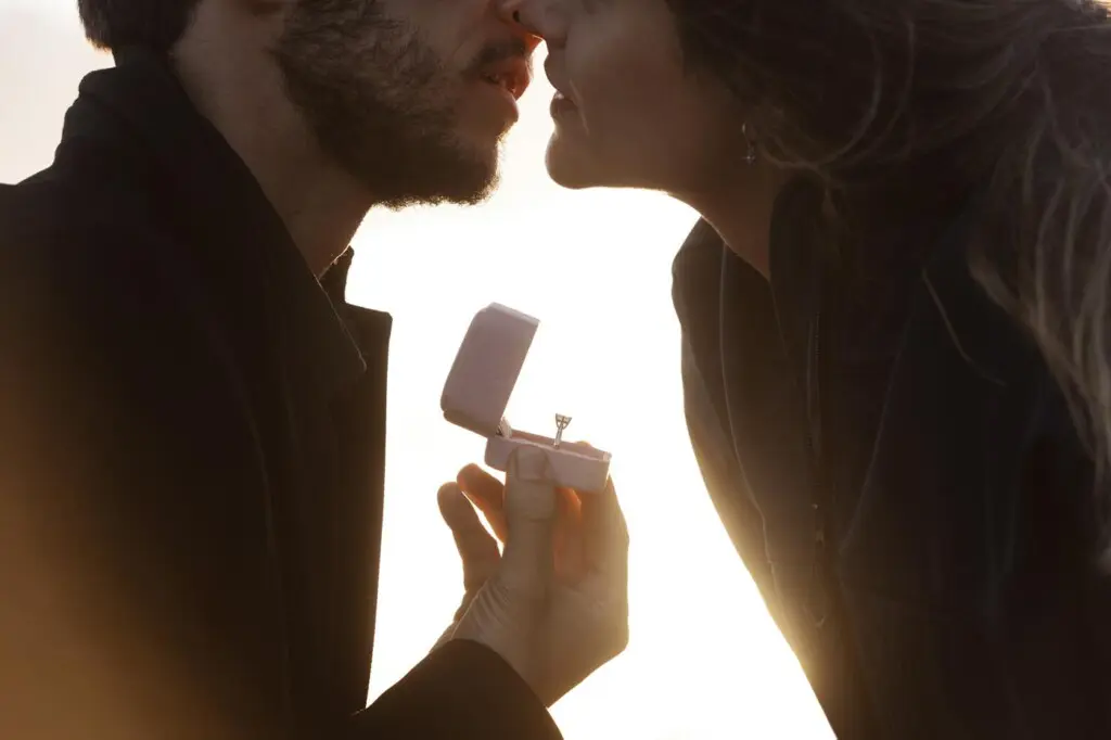 side view man proposing woman